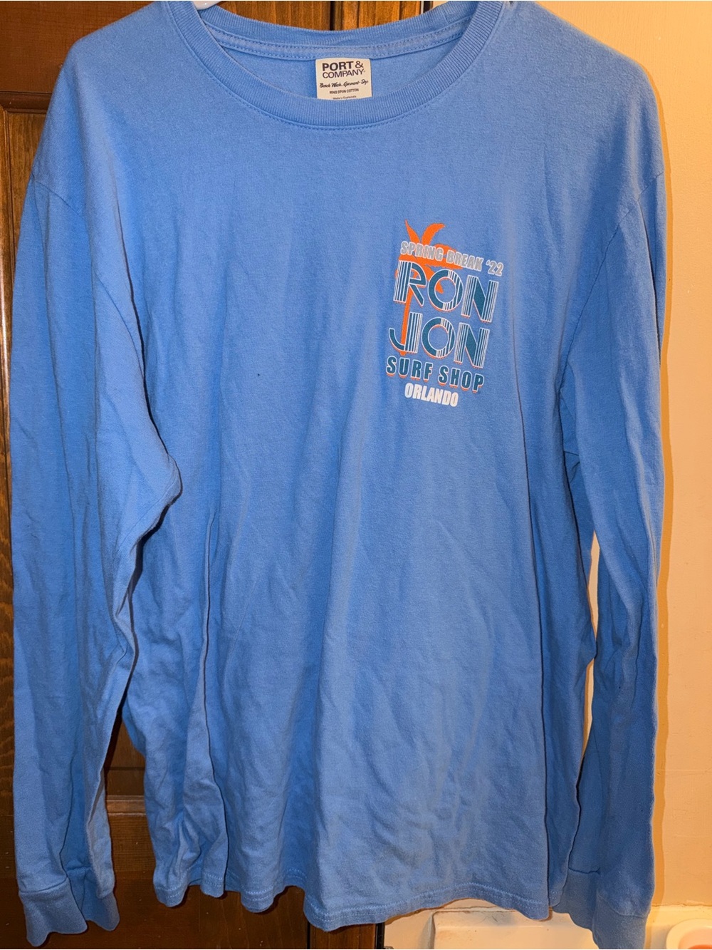 Port & Company Light Blue Long Sleeve Surf Shop Graphic Tee